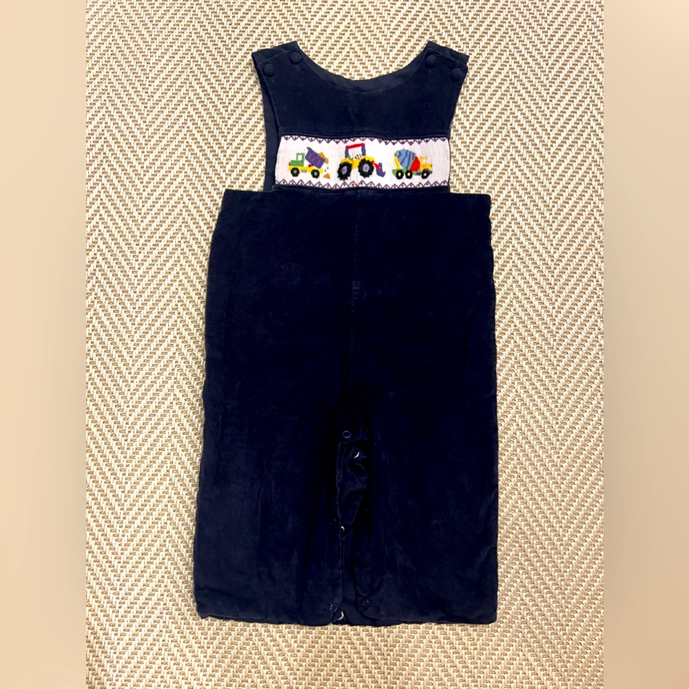 Zuccini navy corduroy construction smocked longall. Size 18 mo. No flaws.